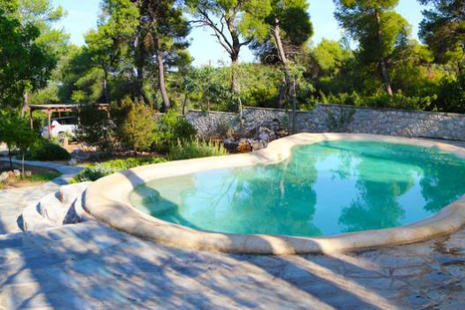 Maison de vacances familiale de style grec traditionnel,